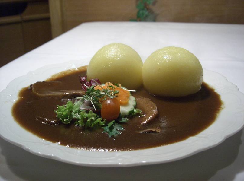 Sauerbraten in a gingerbread sauce with dumplings Sauerbraten in a gingerbread sauce with dumplings